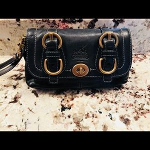 Coach black leather wristlet with brass hardware